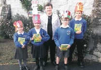 Judge has a difficut task judging St Mary’s pupils’ Easter bonnets