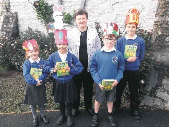 Judge has a difficut task judging St Mary’s pupils’ Easter bonnets