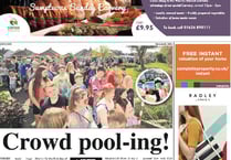 KINGSTEIGNTON: Huge queues lead up to the entrance to the outdoor pool for the first day of the new season