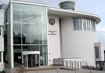 Inmate denies drug smuggling charges