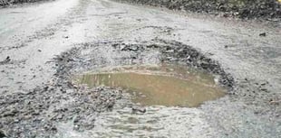 Road’s ‘bomb craters’ damaging cars daily