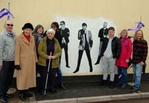 Street artist Mos restores Teignmouth's Muse mural