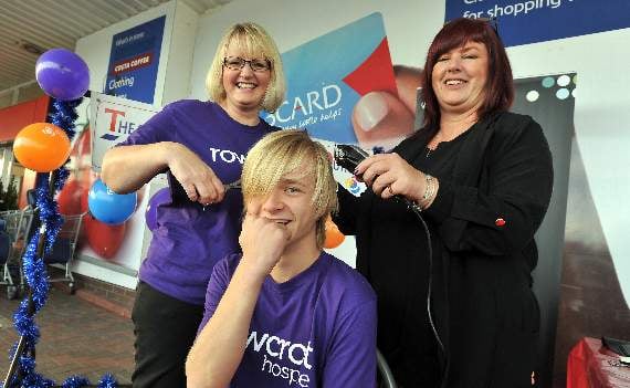Young Owen loses his locks for charity