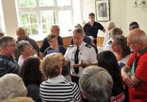 Emotions run high at fire cuts meeting