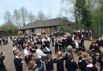 Pupils Sing the Blues Away