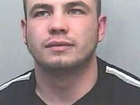 Inmate bit three prison officers during struggle