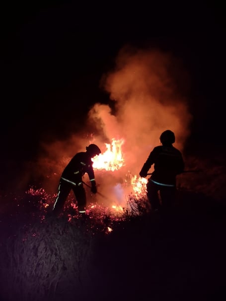 Firefighters tackle the blaze on Dockwell Ridge,Dartmoor. Photo: Buckflastleigh Fire Station