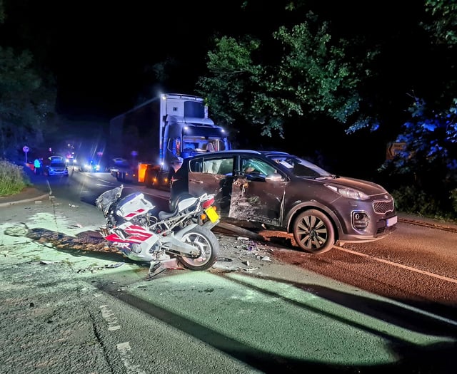 Two hurt in crash between motorbike and SUV