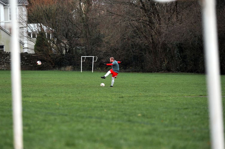 Photo: Steve Pope MDA020121C_SP001
Football. Covid practice. A single player makes use of the space on the pitches at Coach Road in Newton Abbot
