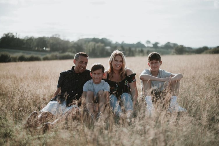 Rob Hooper with his family