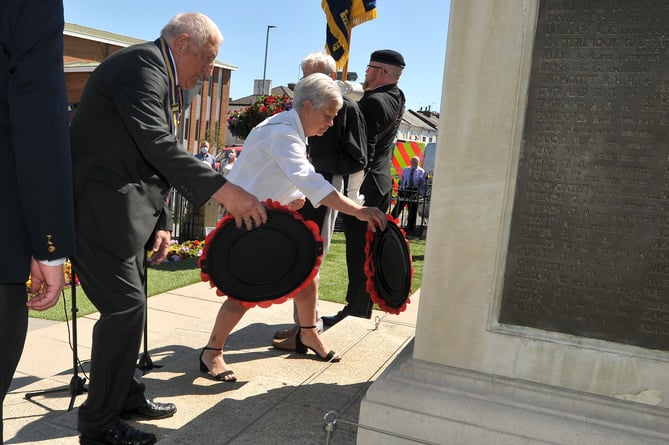 Photo: Steve Pope. MDA140622A_SP003

Commemorative service at Newton Abbot War memorial marking 40 years since the end of the Falklands War. Newton mayor Carol Bunday and RBL president Mike Joyce place wreaths at the memorial