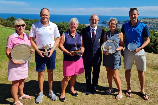WINNERS LINE-UP: Kate Eustace, Sean Mason, Max Anderson, club captain Nick Webb, Hannah Stephens and Ant Stephens.

Teignmouth Golf Club