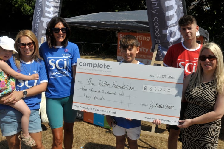 Rob Hooper charity match: Complete cheque