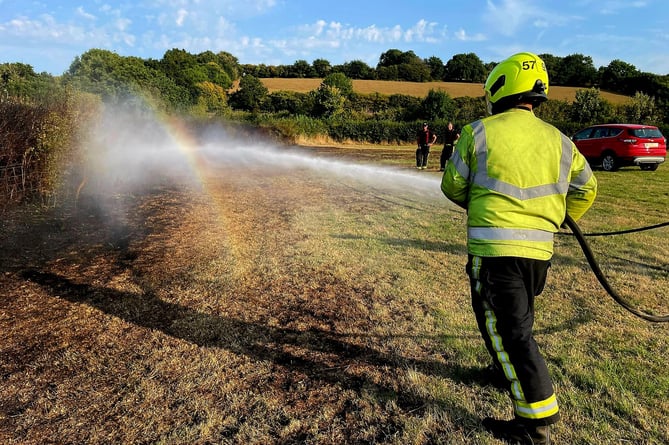 Firefighters tackling a grass fire near Ashburton.  ©BuckfastleighFireStation