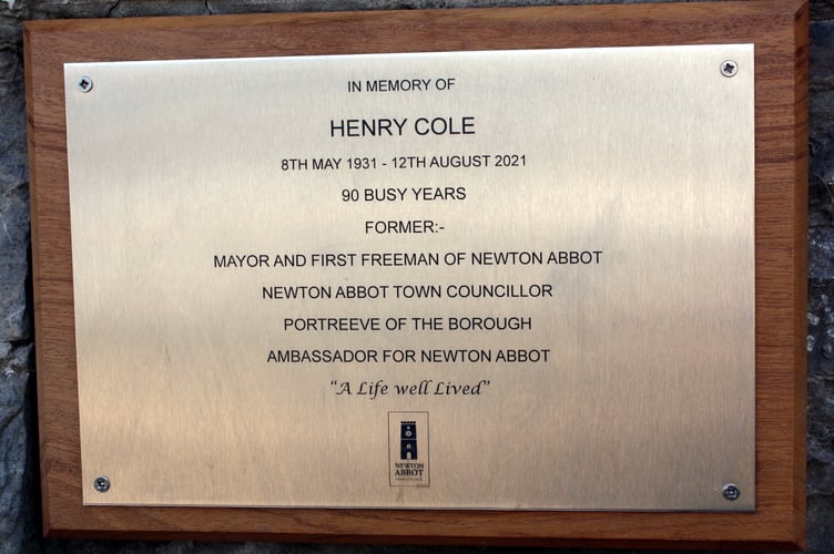 The commemorative plaque at Courtenay Park, Newton Abbot