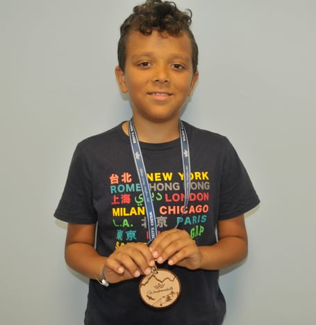 Emir Fazzani, 9,  with his medal.