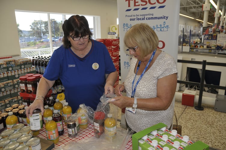 Janette Parker, Tesco Kingsteignton’s community champion, and Jean Patterson, vice chairman and volunteer at T.H.A.T