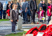 Young son of of Royal Marine pays his respects