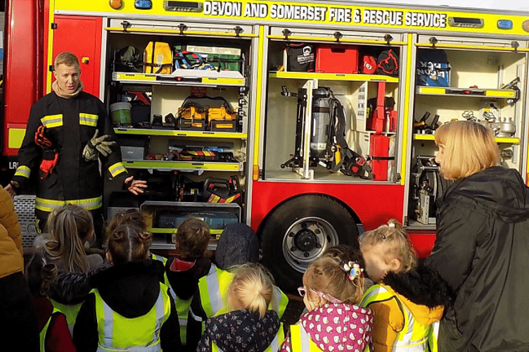 OUR FIRE HEROES: The children from Little Swans Pre-school visited the fire station at Dawlish
