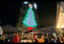 Father Christmas switches on town’s lights