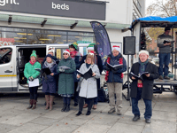 Dog owners and their four legged friends gather for carol service
