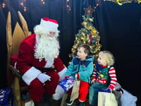 Father Christmas comes to school