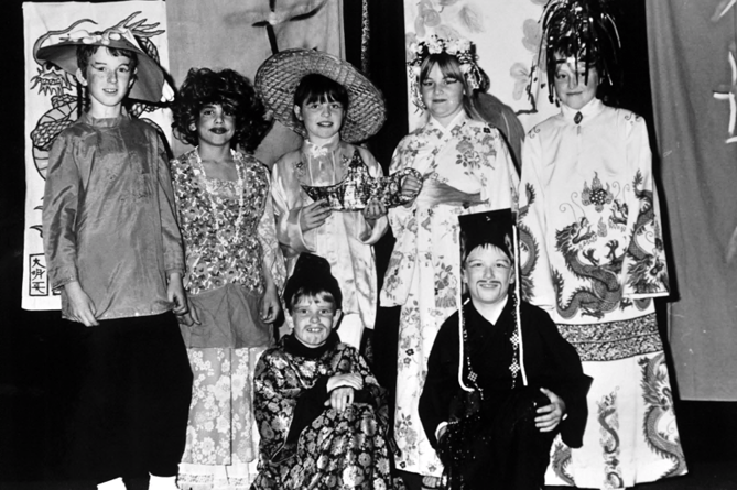 Inverteign School’s production of Aladdin from December 1988. Pictured here are: Justin Lewis (Wishy-Washy), James O’Mally (Widow Twankey), Tim Seale (Abanaza), Vicky Dixon (Aladdin), Katherine Lane (The Princess), Dean Elliot (Chop-Suey) and Julie Roberts (Empress Dragonora).