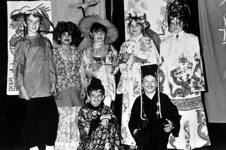 Inverteign School’s production of Aladdin from December 1988. Pictured here are: Justin Lewis (Wishy-Washy), James O’Mally (Widow Twankey), Tim Seale (Abanaza), Vicky Dixon (Aladdin), Katherine Lane (The Princess), Dean Elliot (Chop-Suey) and Julie Roberts (Empress Dragonora).