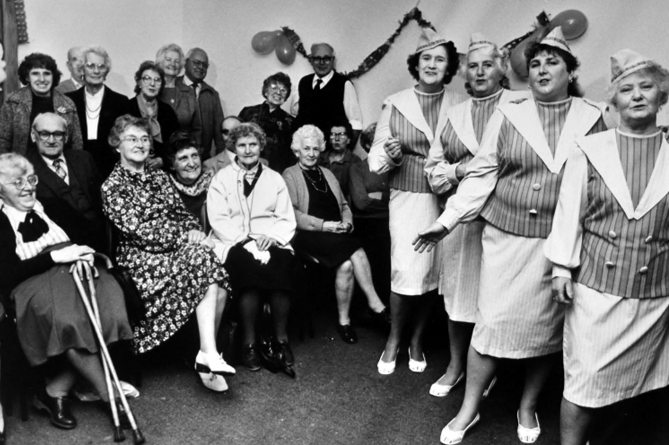 Pensioners in Abbotskerswell enjoy a Christmas party in the village hall with entertainment from the Melody Makers