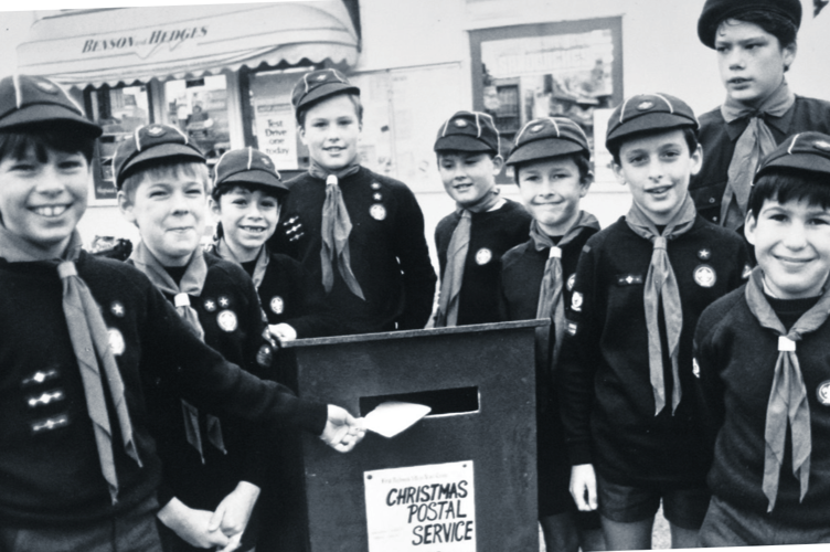 Post early for Christmas was the message from 1st Highweek Village Scouts in November 1988 with the start of their Christmas postal service at Mile End Stores