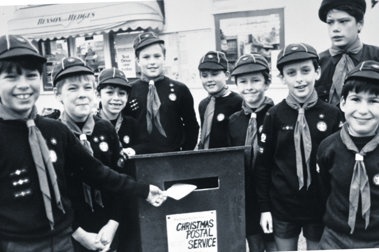 Post early for Christmas was the message from 1st Highweek Village Scouts in November 1988 with the start of their Christmas postal service at Mile End Stores