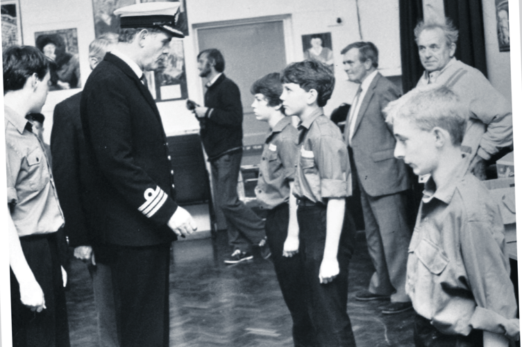 Ensuring everything is shipshape – Commander Cameron RN inspects sea scouts at Teignmouth Lower School in October 1988.