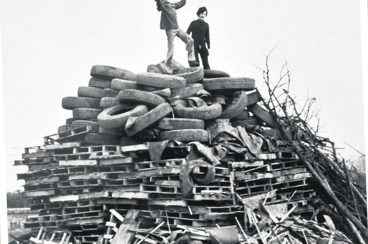 Kings of the castle - two youngsters atop the bonfire night prye at Newton Abbot Racecourse in 1977.