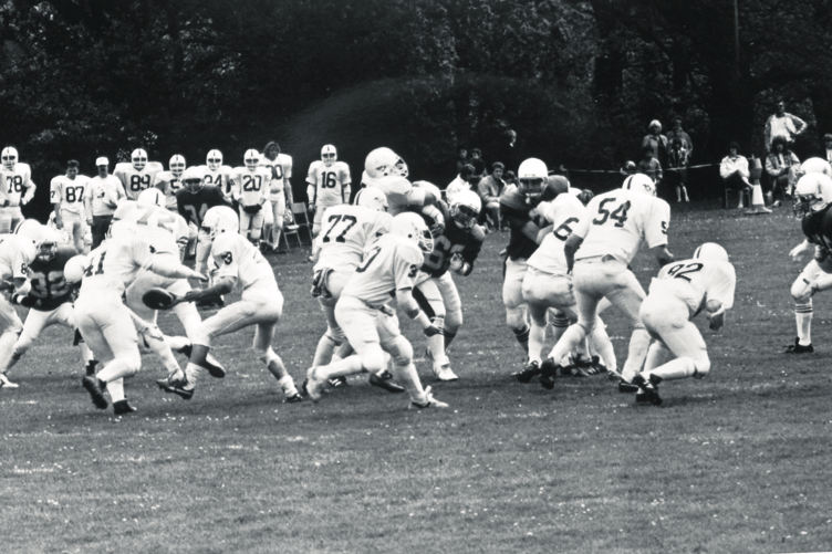 Gridiron action as American Football is played for possibly the first time in Keyberry Park, Newton Abbot. Details are a bit scant about who the teams were but it’s possible one was the Torbay Trojans.