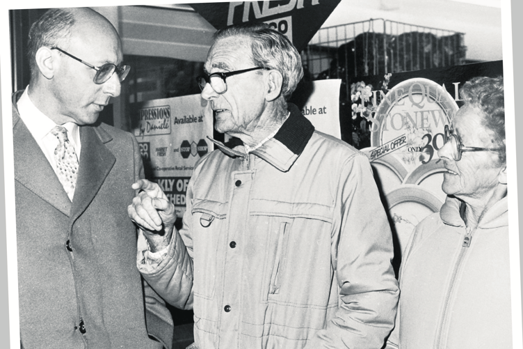 Labour shadow home secretary Gerald Kaufman MP is put on the spot by Teignmouth residents Len and Frances Wright when visiting the town in November 1986