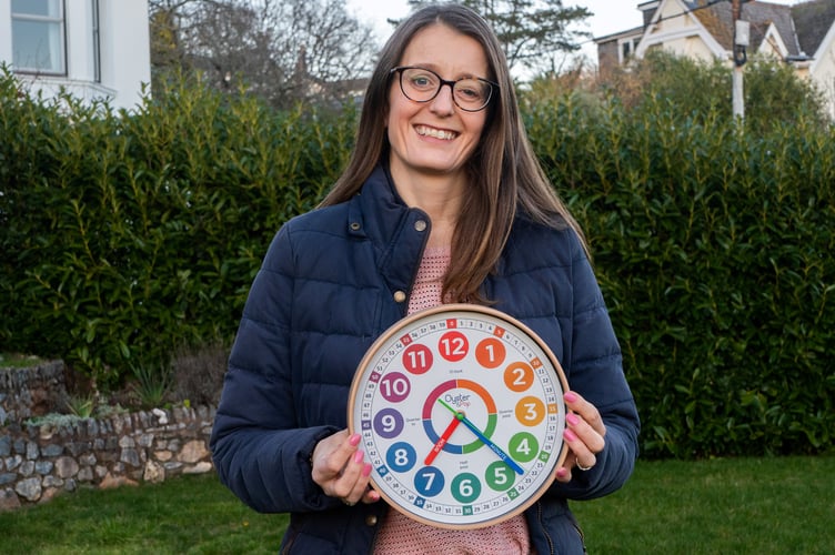 Emma Ross-McNairn photograped with her Oyster Pop Clock on the 19/01/2023. See SWNS story  SWLNclock. A children's clock business has been sent a letter by luxury watch makers ROLEX - demanding it rebrands. Oyster & Pop sell a collection of colourful wall clocks and charts designed to help children learn to tell the time - which retail at about Â£20. The company was set up by sisters Emma Ross-McNairn and Sarah Davies and is named after Oyster Bend in Torbay, Devon - where they grew up. But lawyers for the eight-billion dollar company Rolex wrote to âOyster & Popâ in early January to demand they rebrand.  