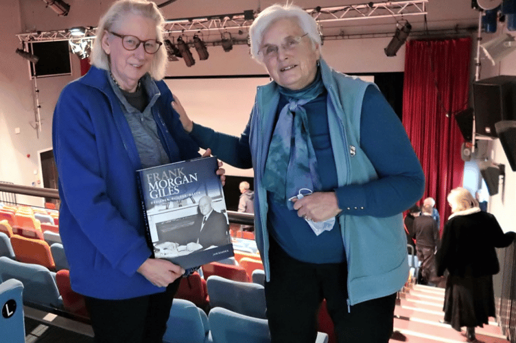 Jane Shaddick (L) does a behind the scenes presentation of the Morgan Giles book to Viv Wilson after her show at the Teignmouth Pavilions.