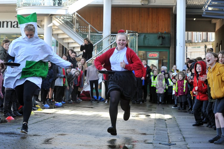 Photo: Steve Pope MDA250220A_SP002
Market Square, Newton Abbot. Wolborough C of E Nursery and Primary School pancake races