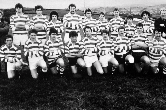 Ashburton’s rugby team pose for a team picture at their Caton Cross ground before a match against HMS Leander at
the end of October 1982