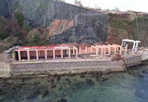Rail engineers work on rockfall shelter