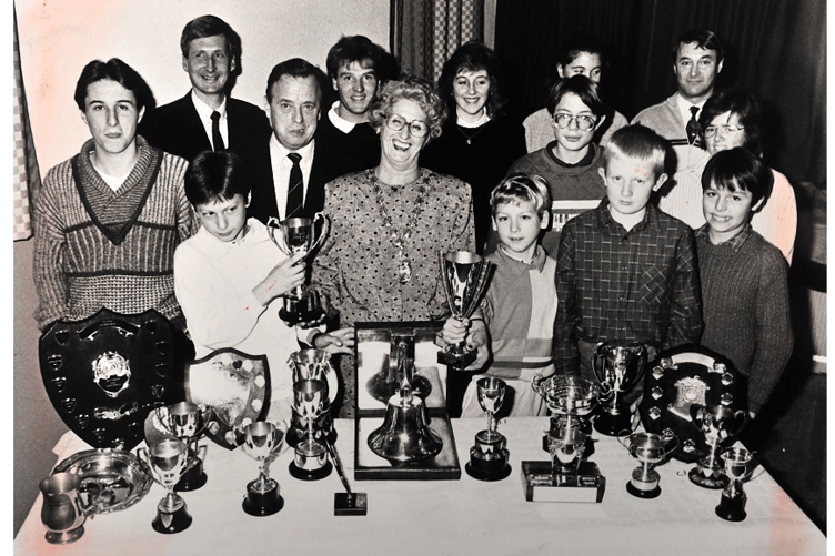 November 1988 and Teignbridge Council chairman Maggie Stanton joined trophy winners at Shaldon Sailing Club for their presentation evening.