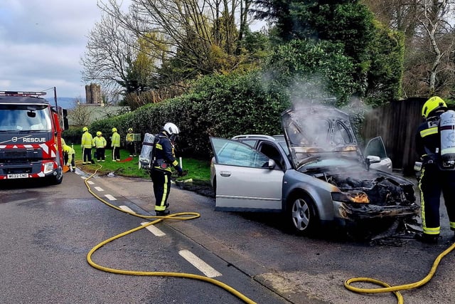Pictures of car severely damaged in fire on A38 this morning