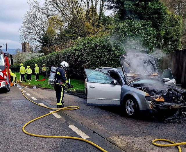 Pictures of car severely damaged in fire on A38 this morning