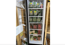 Supermarket champion Liz sees surplus food fill community fridge 