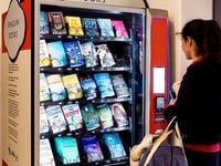 Penguin installs book vending machine at St David's Station in Exeter
