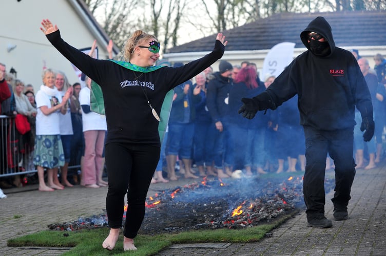 MDA140423A_SP024 Photo: Steve Pope
Rotary Newton Abbot charity fire walk at Buckland Football Cub