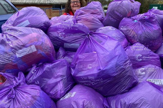 Claire Hannaford with her clothing donations