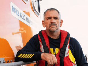 Lifeboat crew celebrate top volunteer