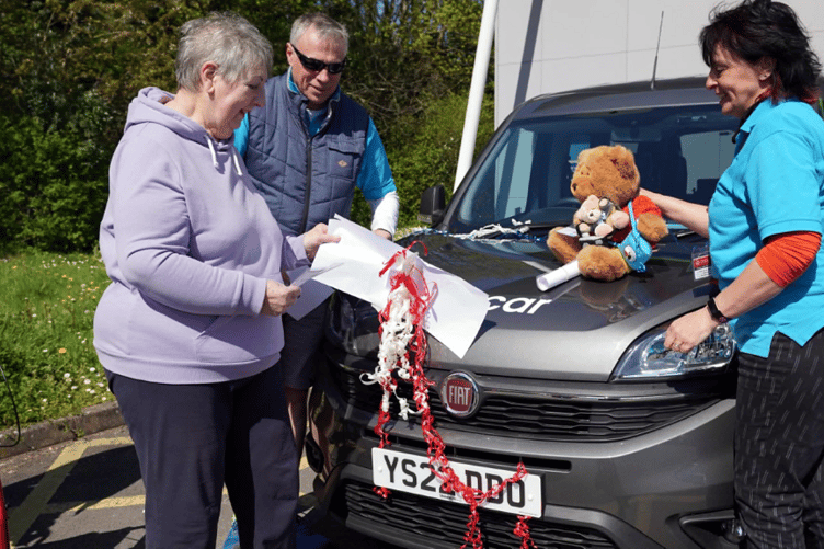 Wendy Haigney receiving her Certificate by Ian Davies our Fleet Co-ordinator (sharing in the Celebration is our Travelling Ted who’s getting quite a name for himself travelling around in the community).