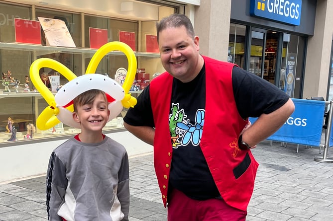 Eight-year-old Eight-year-old Tommy Walton, a  Newton Abbot lad loved his coronation crown in Newton Abbot town centre this morning. 
Picture: Sally Henley (6-5-23)